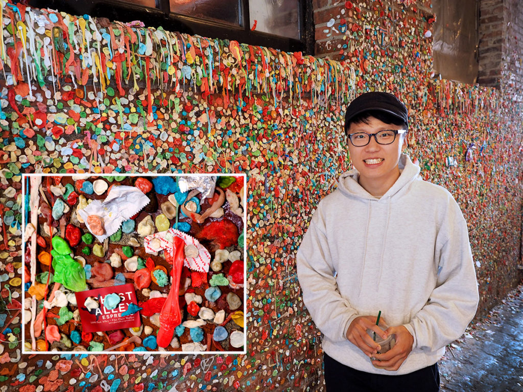 New York tourist explores Seattle's infamous gum wall.