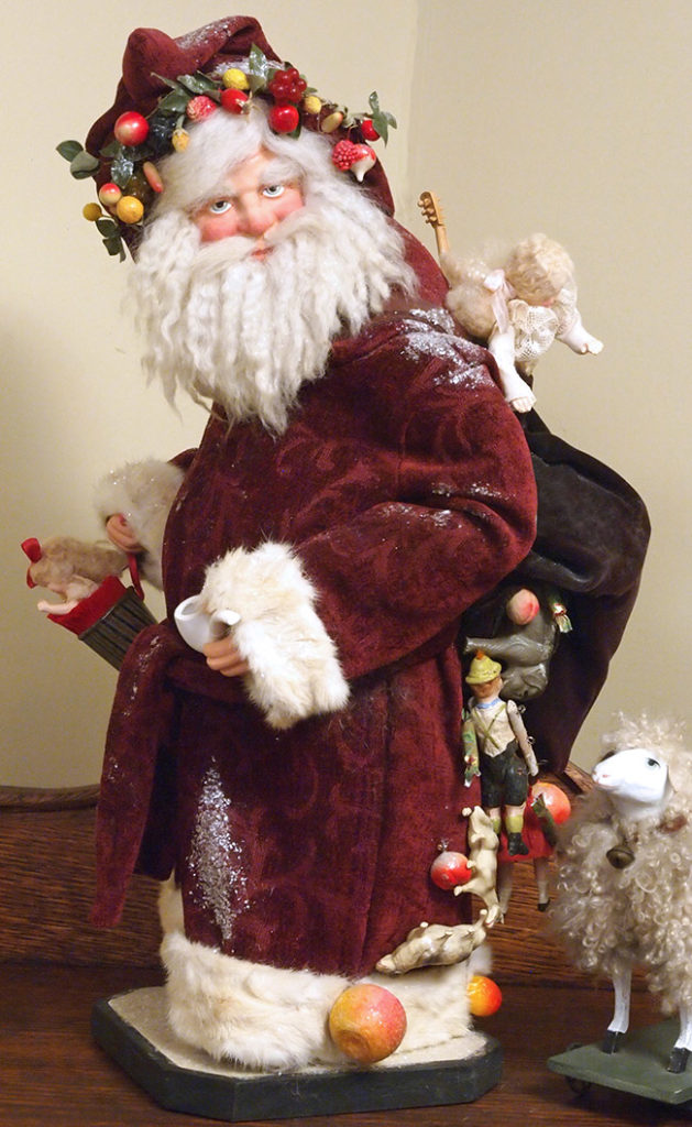 Yvonne Carpenter's custom-made Father Santa with a sack spilling out toys